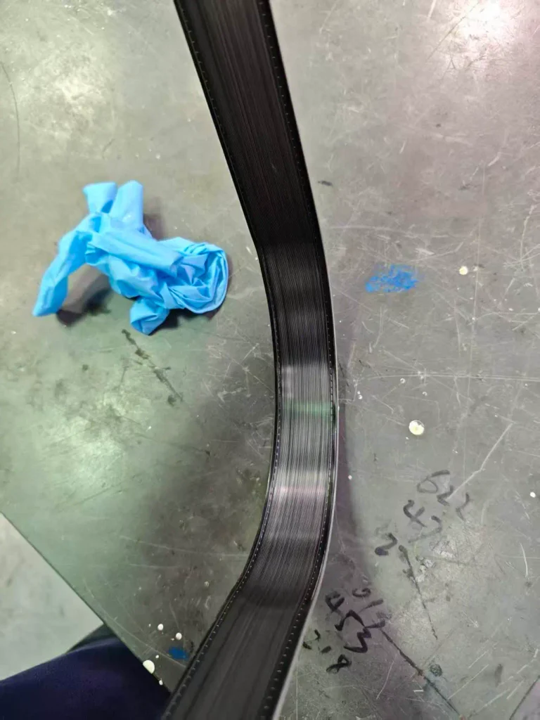 Large-radius bending of 38.5A fluorocarbon coated aluminum spacer bar